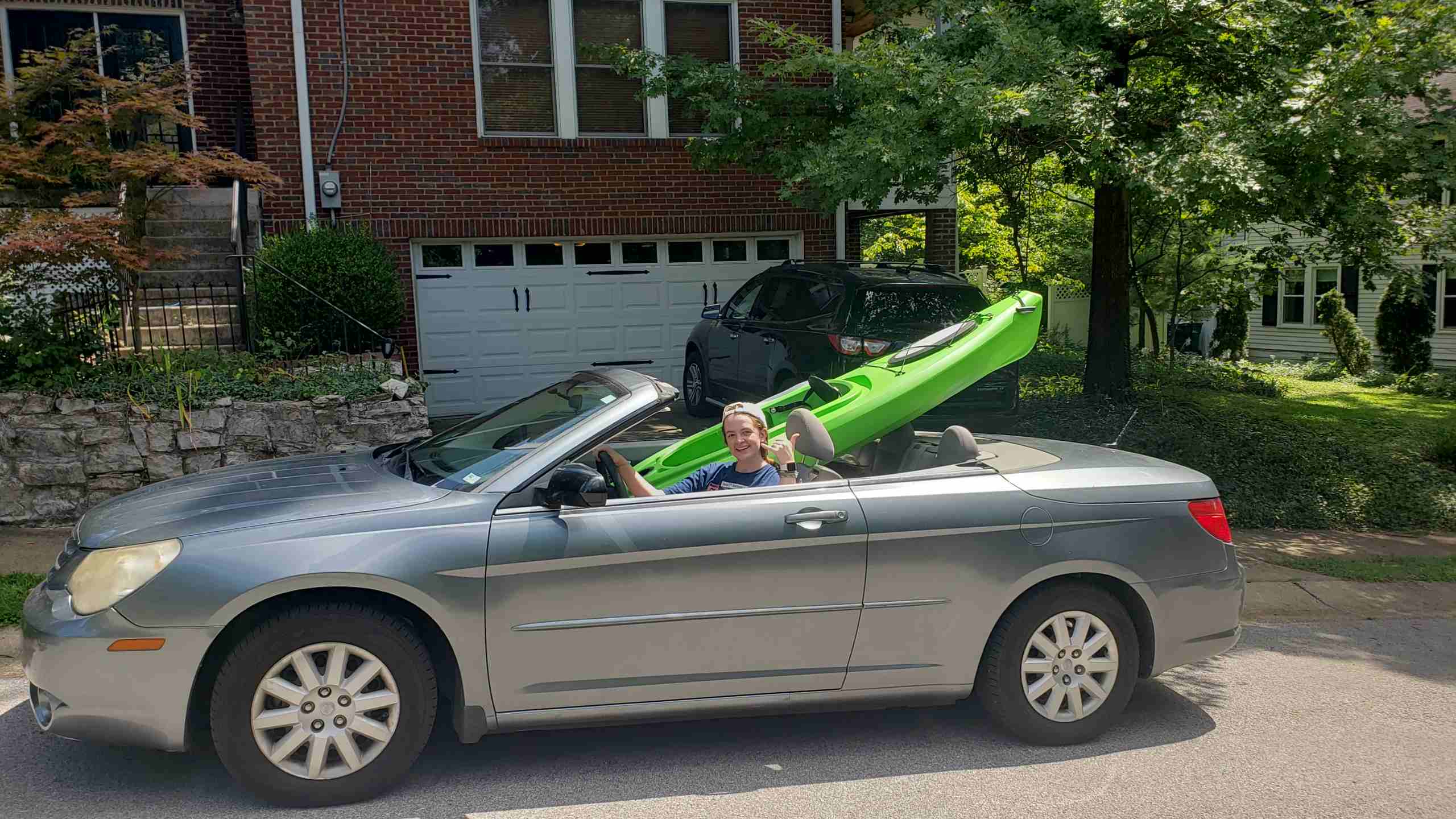 2020-08-22 Jane kayak in convertible.jpg